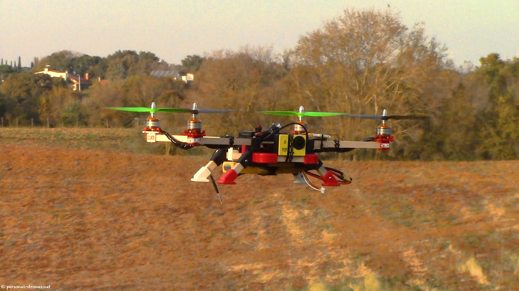 Flying quadcopter drone agriculture farming